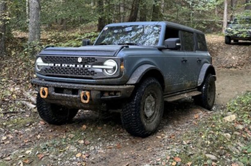 Blue Bronco on trail