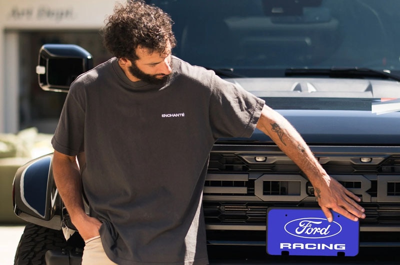 Daniel Ricciardo with truck with Ford Racing license plate 