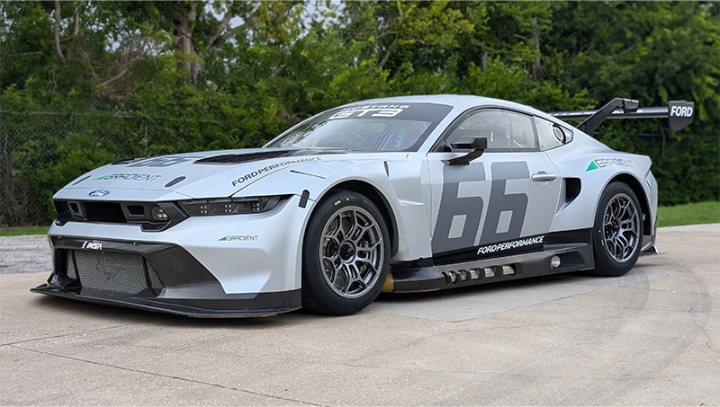 Gray Ford Mustang GT3 with number 66 on side